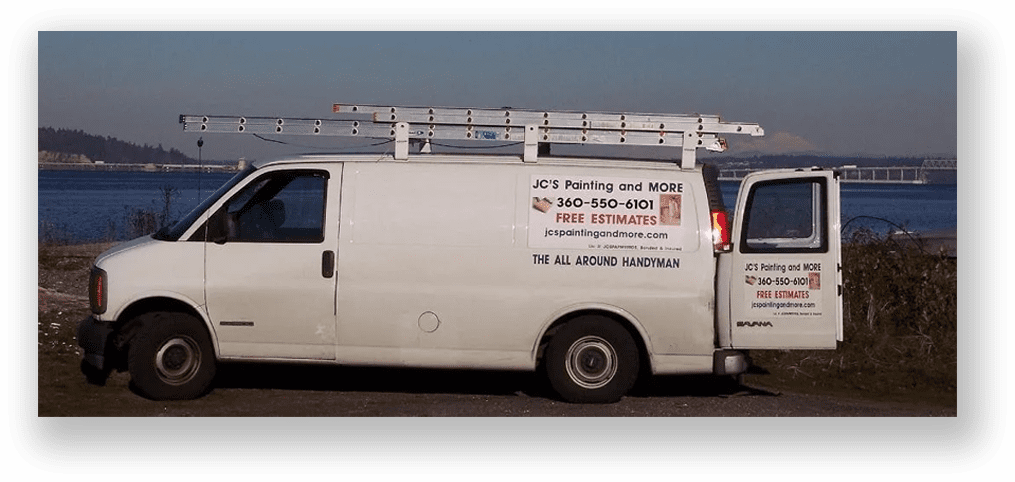 A white van with the company logo on it.