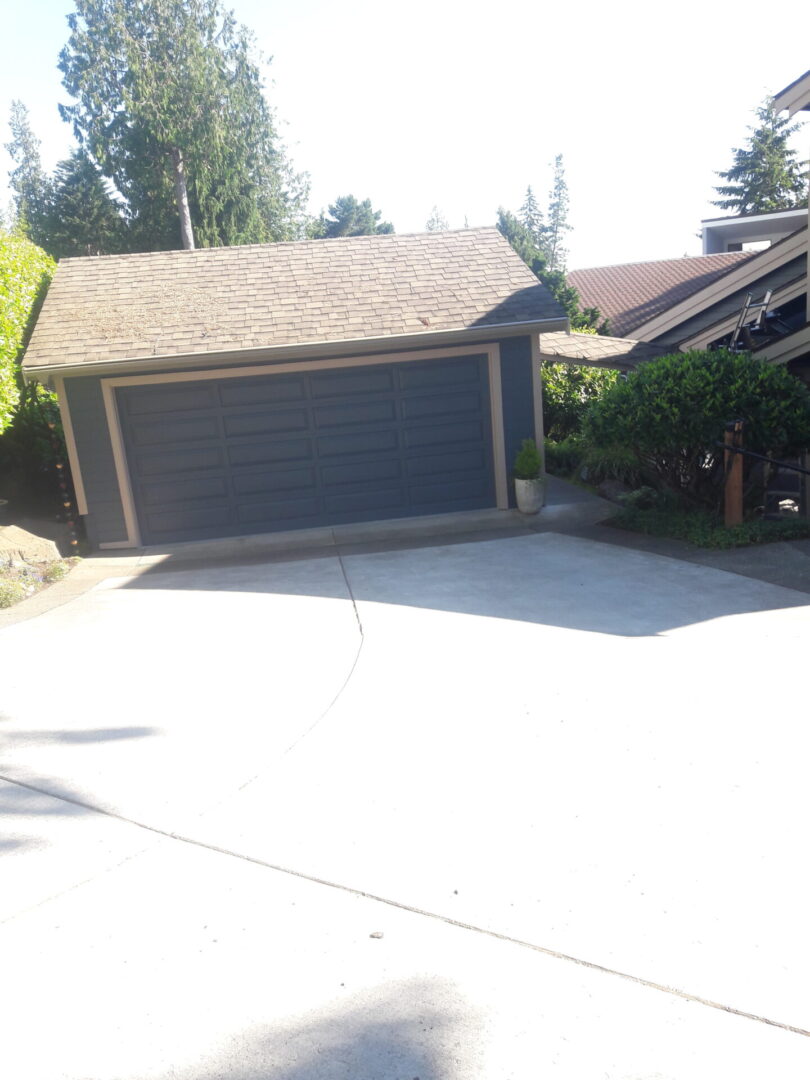 A garage door that is broken in half.