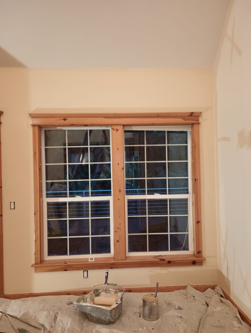 A window with two wooden frames and some windows