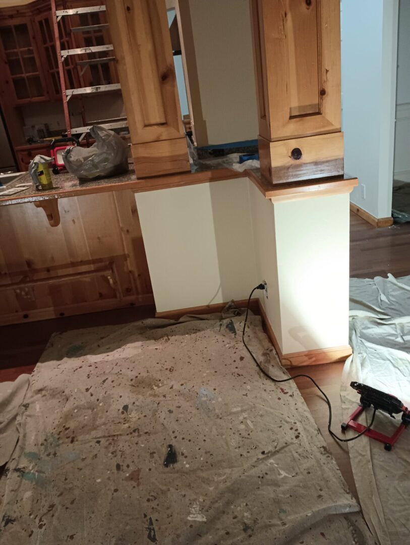 A kitchen being remodeled with the floor in place.